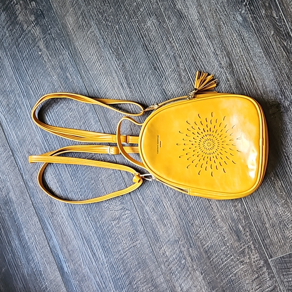 Crossbody or small leather backback
